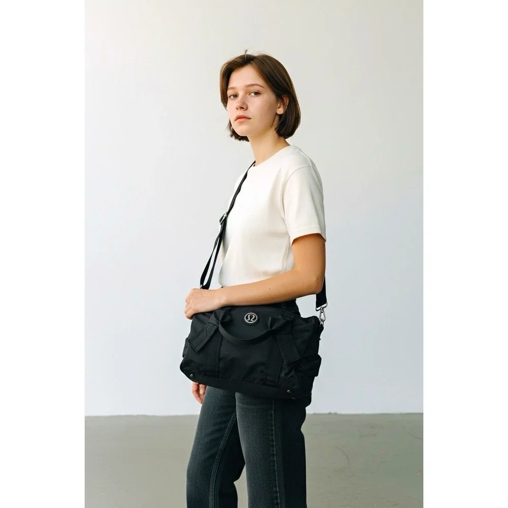Lululemon Black Nylon Duffel Gym Travel Bag Shoulder Strap Logo Tote Bow